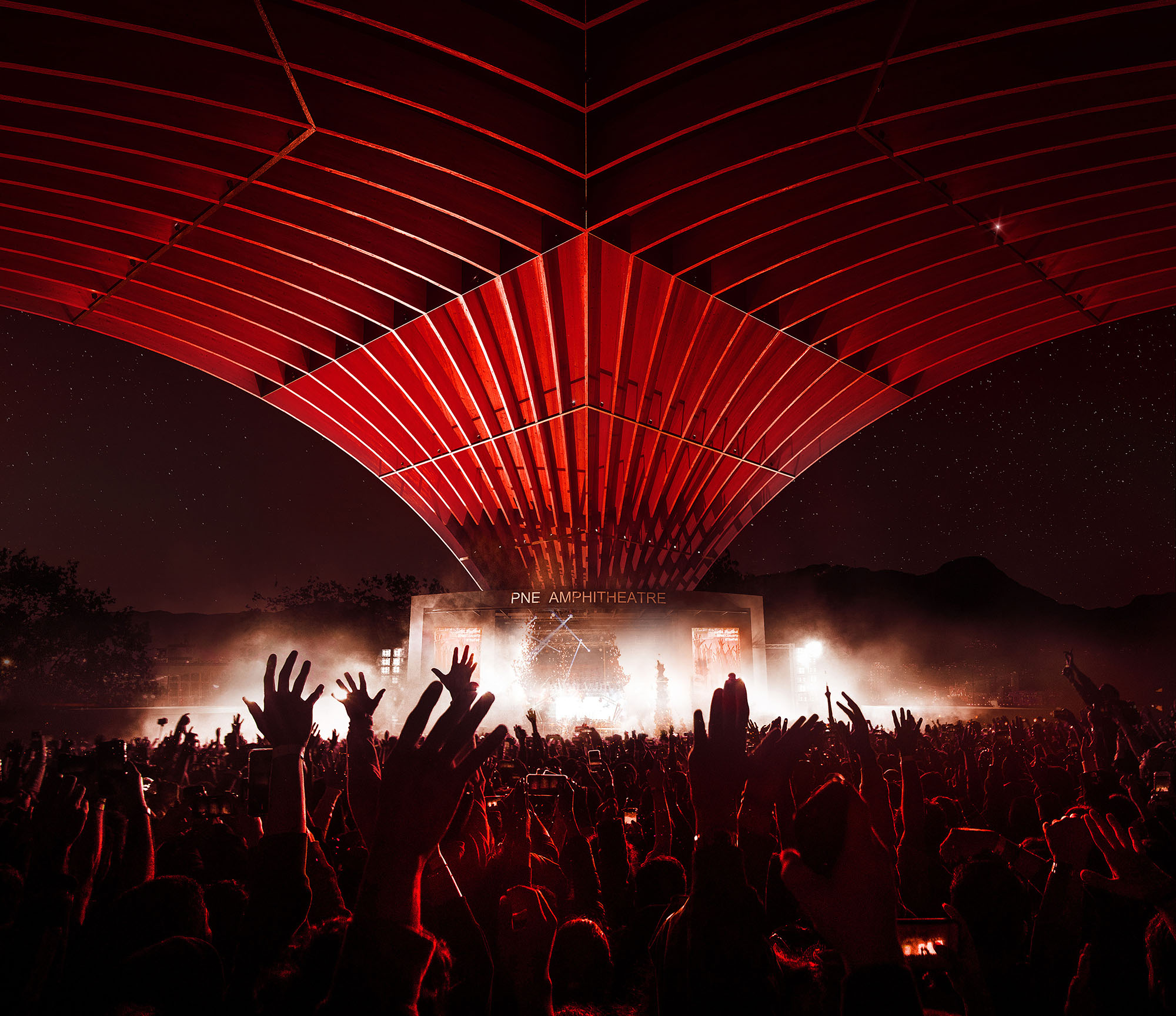 〈PNEアンフィシアター／フリーダム・モバイル・アーチ（PNE Amphitheatre / Freedom Mobile Arch）〉設計：レヴェリー・アーキテクチャ（Revery Architecture）